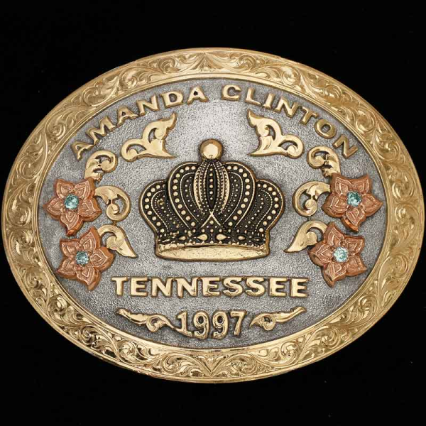 "The Llano Custom Belt Buckle is the picture of western elegance and grace. Crafted on an oval, German Silver base with a matted finish. Detailed with an intricate hand-engraved, Jewelers Bronze edge and Copper flowers. 

Customize it with your let